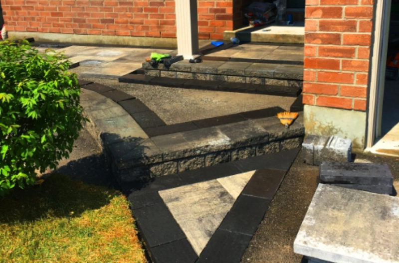 Modern patio construction with brick accents