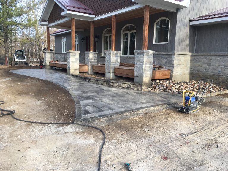 Newly paved pathway by house entrance