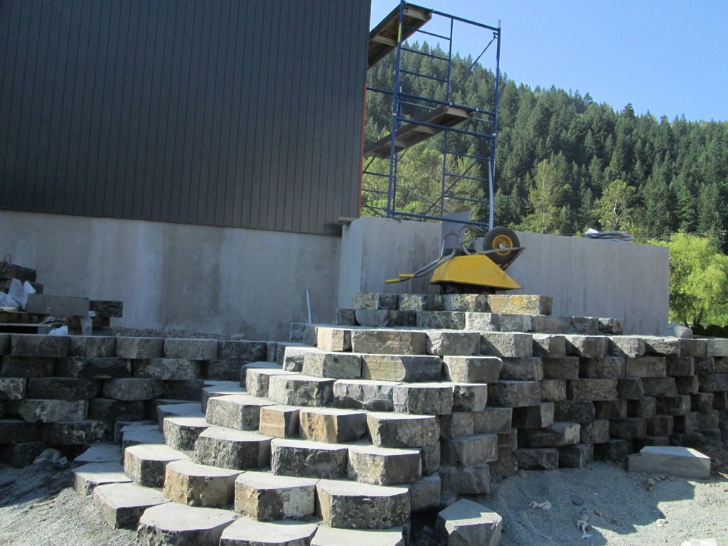 Stone steps under construction with scaffolding