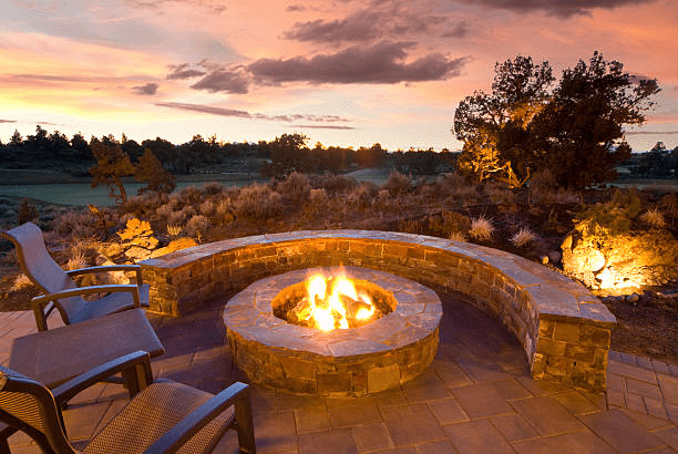 Fire pit on patio at sunset