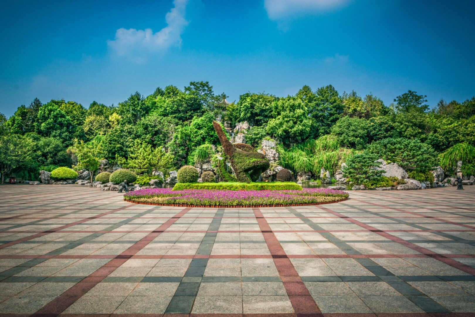 Large paved area with greenery