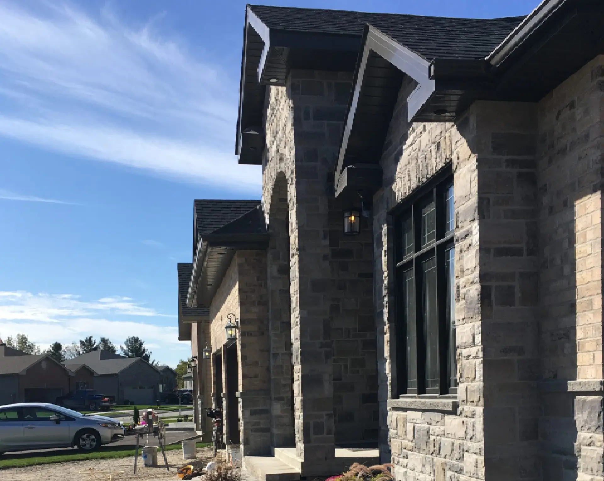 Modern stone facade with windows